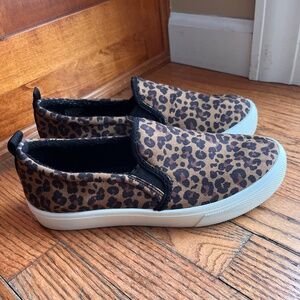 Sketchers Slip-On Sneakers with a leopard print canvas upper